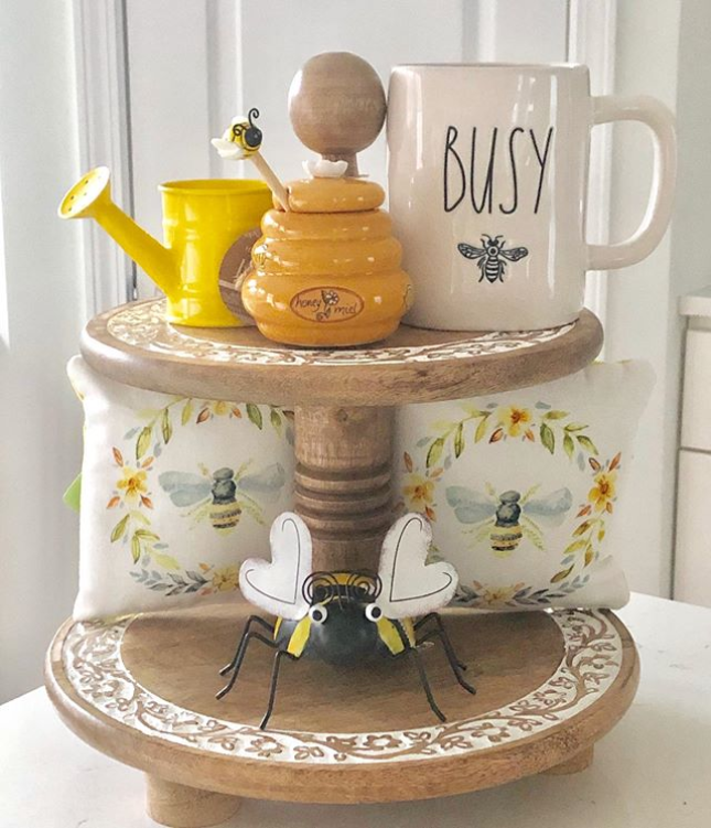 Two-tier wooden tray decorated with bees and honey theme