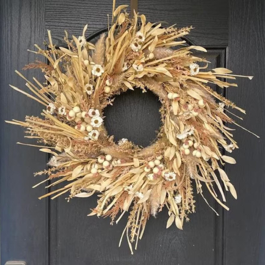 Autumn wreath made with wheat and fall florals